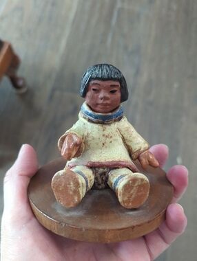 Inuit Child Sitting Sculpture By Nori Peter